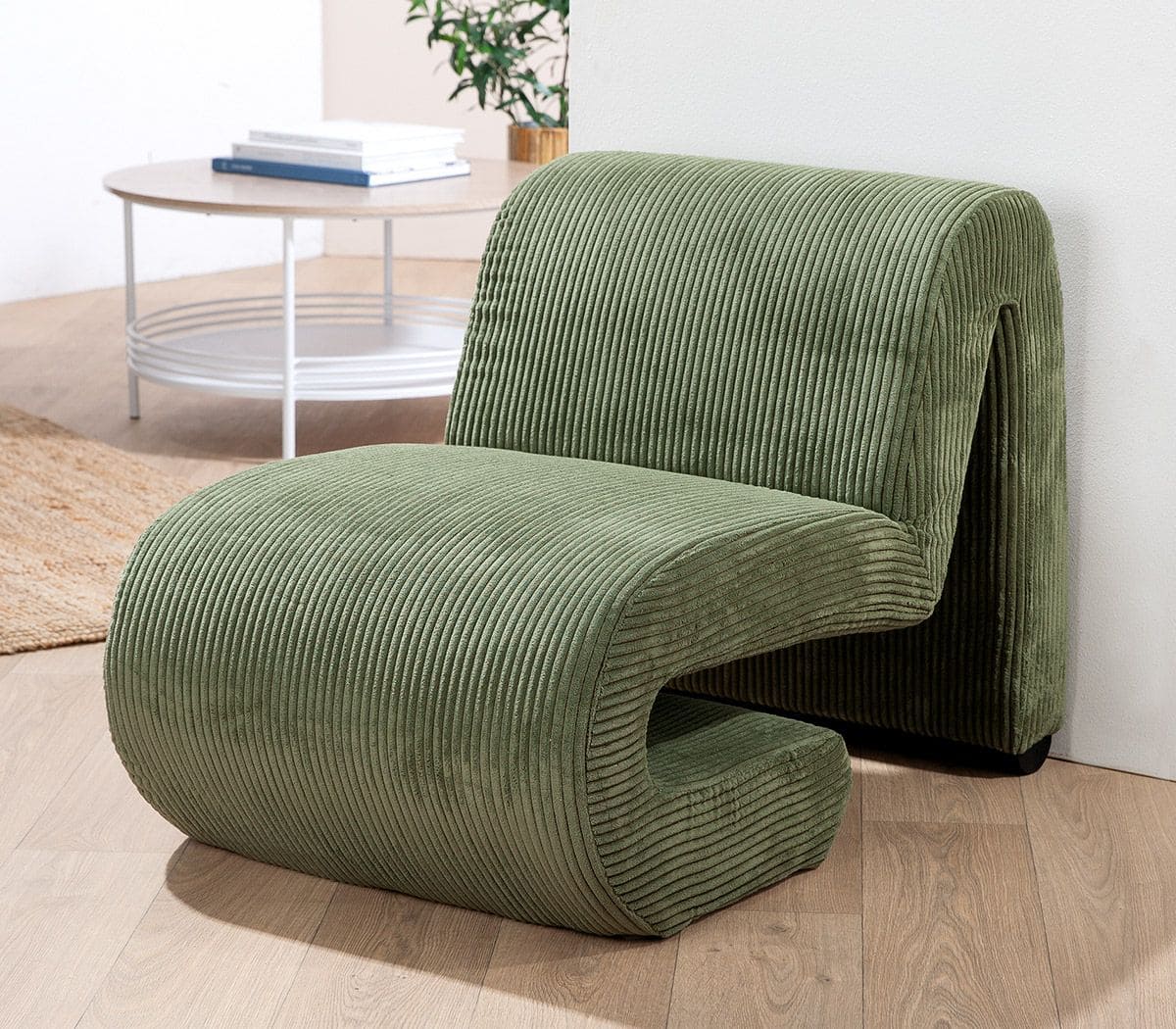 Fauteuil en velours cotele vert